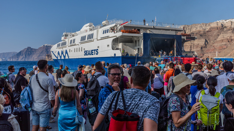 Cruise ship crowds disembark ferry, Santorini