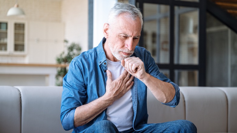 Man coughing