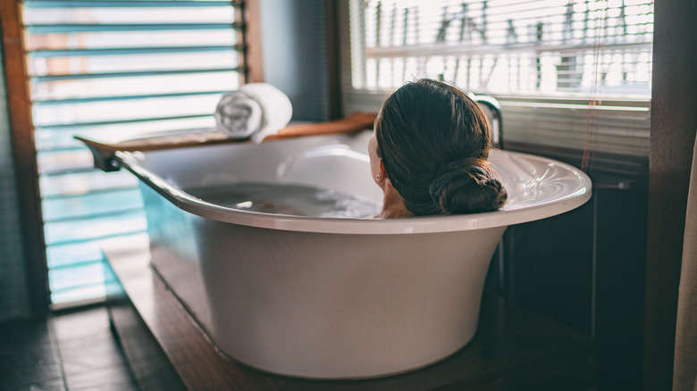 woman bathtub Tahiti vacation rental