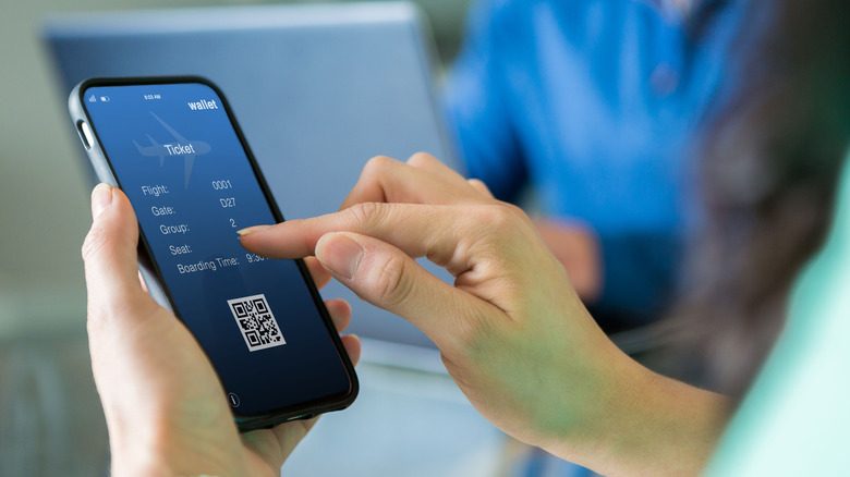 Woman booking a flight online