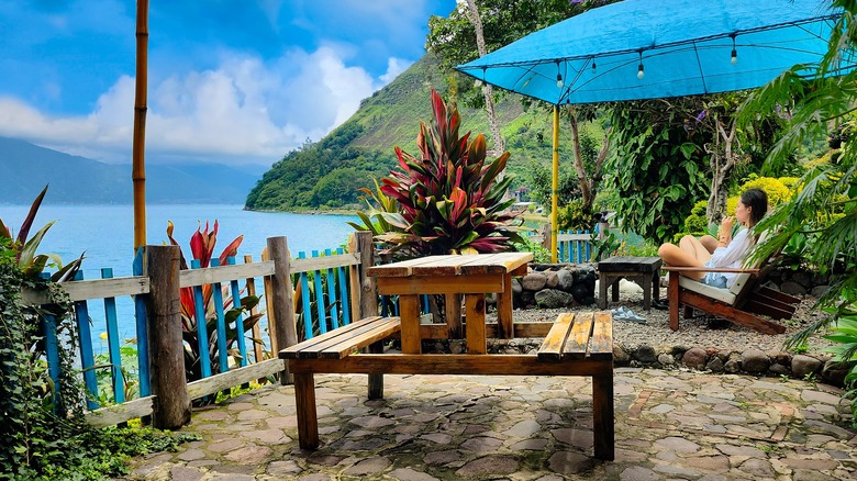 A woman relaxes at a Lake Atitlán resort