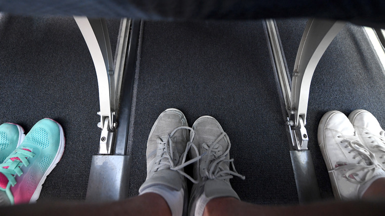 People sitting in economy seats