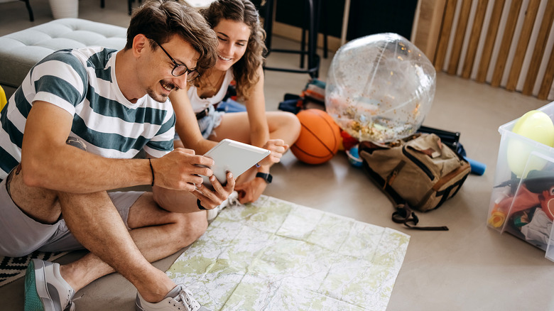 A couple doing travel research