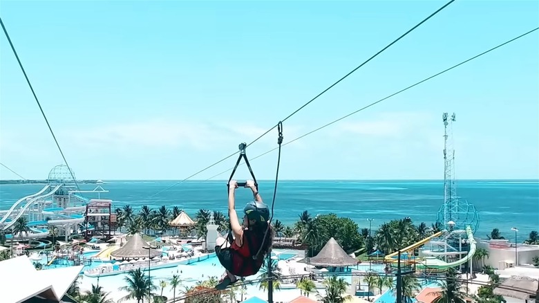 Woman ziplining in Ventura Park