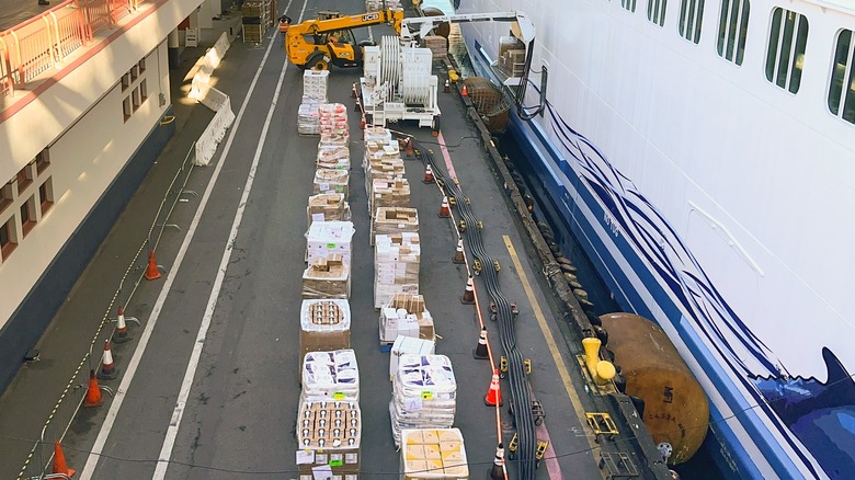 Pallets of food being loaded on a cruise ship