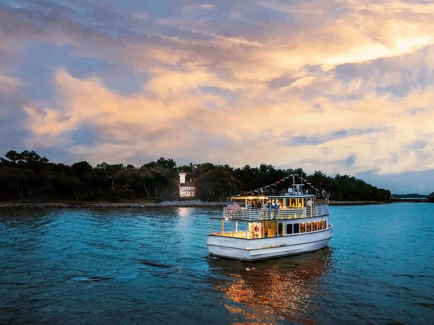 Haig Point ferry on the water at night.