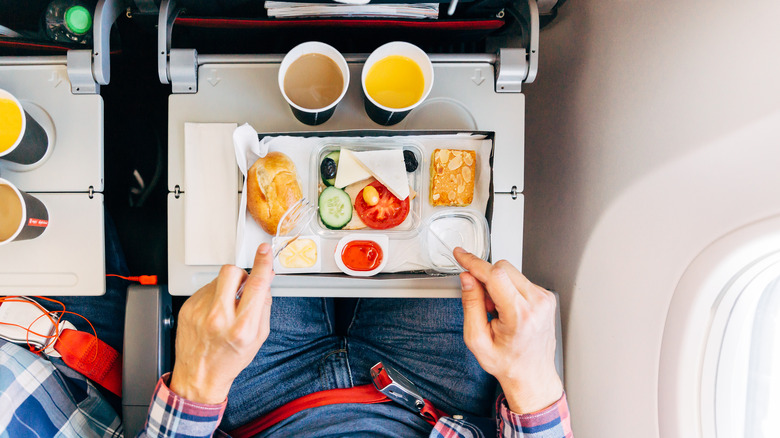 Person eating airplane food