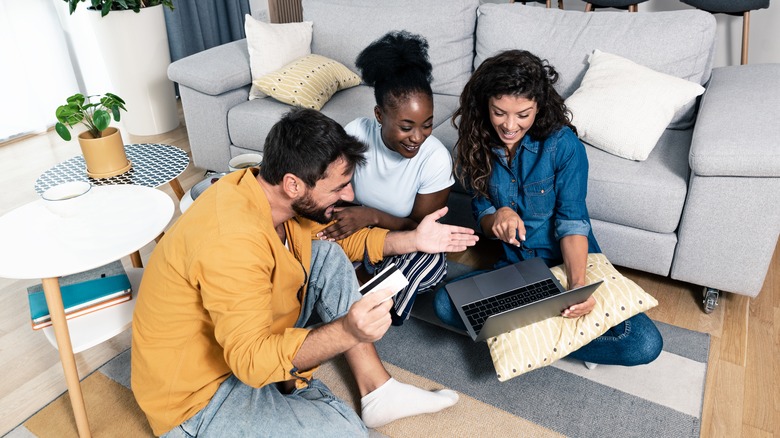 Friends doing research on computer