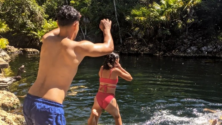 swimmers at Cueva de las Peces