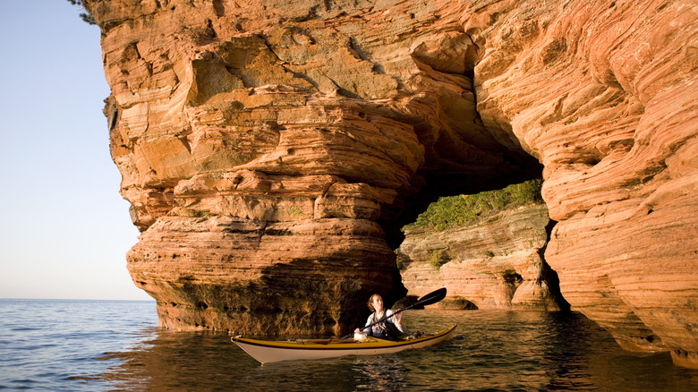 Woman kayaking at Apostle Islands National Lakeshore, Wisconsin