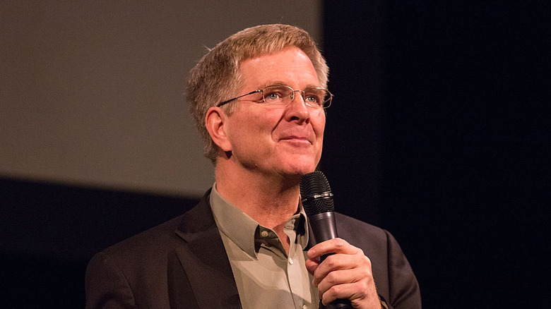 Rick Steves speaking on stage