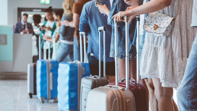 Passengers waiting to board plane