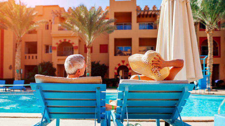 A couple by the pool