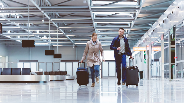 Travelers rushing for their flight