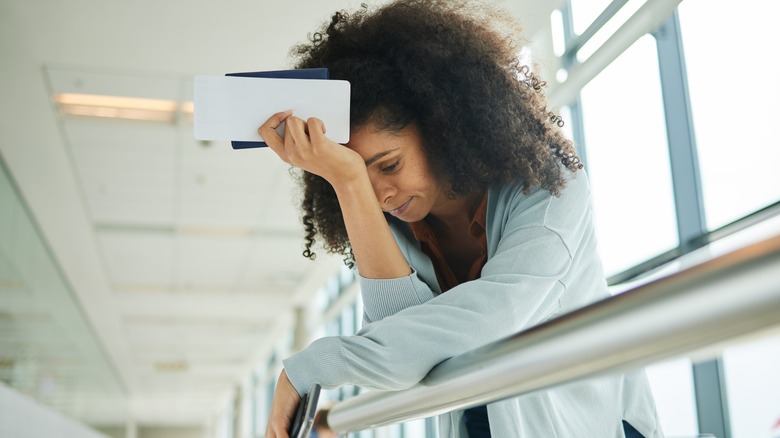 Frustrated woman in airport