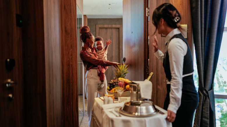 Hotel patrons welcome room service cart