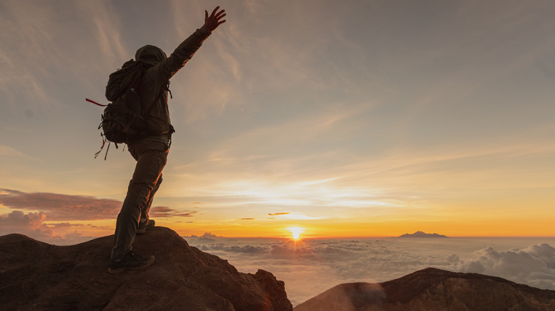 Hiker at the top of Mt. Bakur