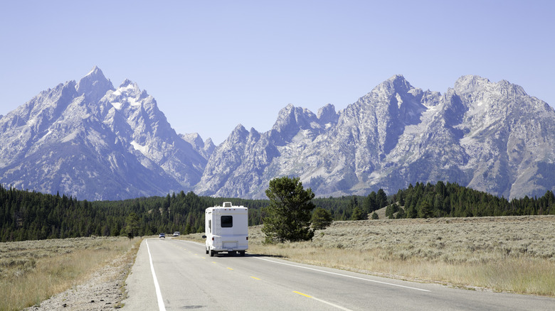 rv driving grand teton mountains 