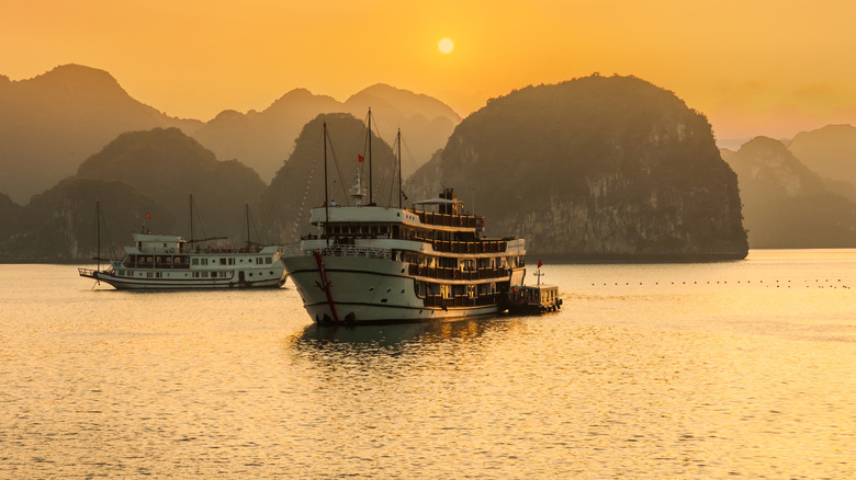 sunset cruise ship mountains