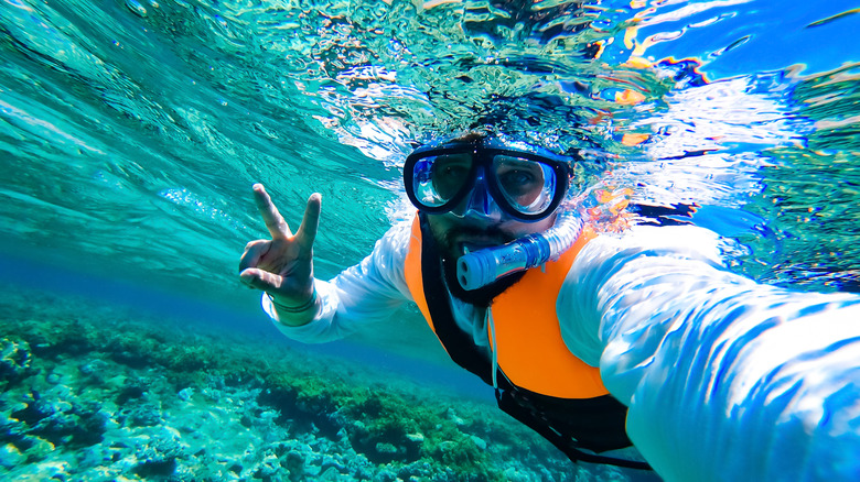 snorkeling in a vest