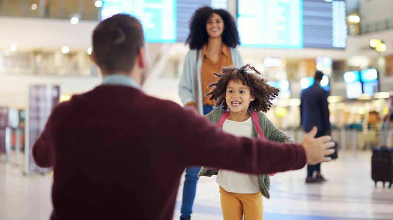 happy family at airport