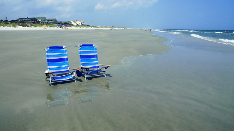 Two beach chairs on a tranquil beach