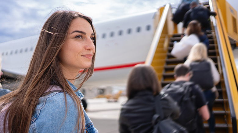 woman boarding plane