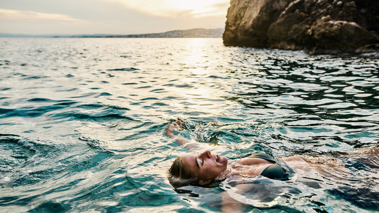 Woman swimming in Europe