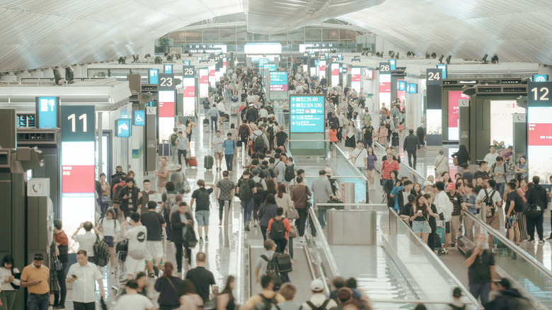 Overhead view of busy airport check-in