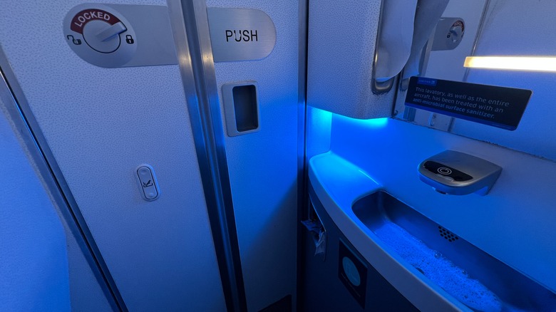 airplane bathroom sink blue light