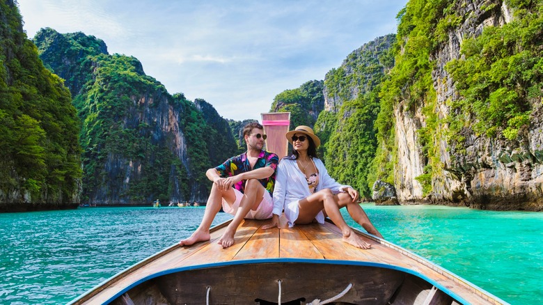 Couple smiling on a boat 