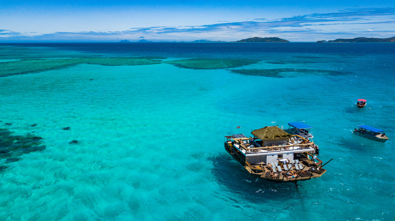 Floating bar in blue sea