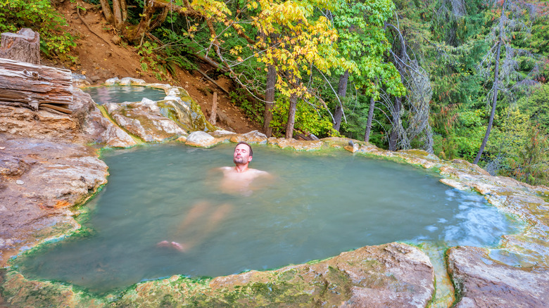 Man in hot spring pool