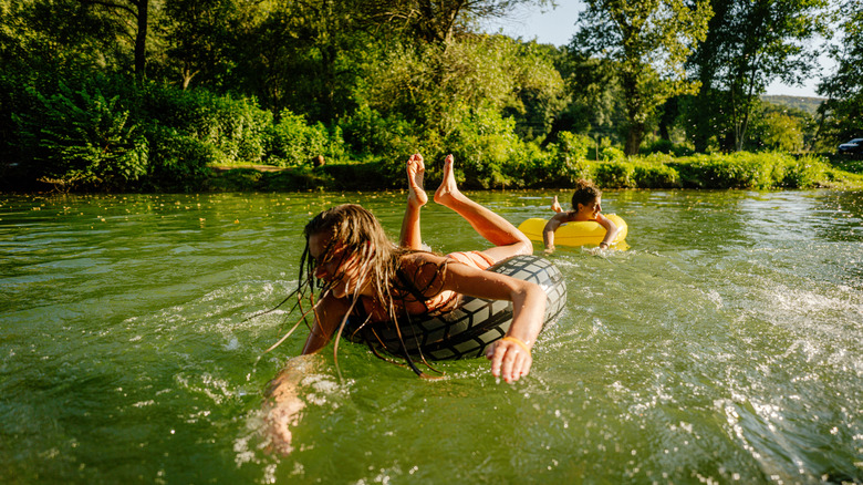 people tubing on a river 