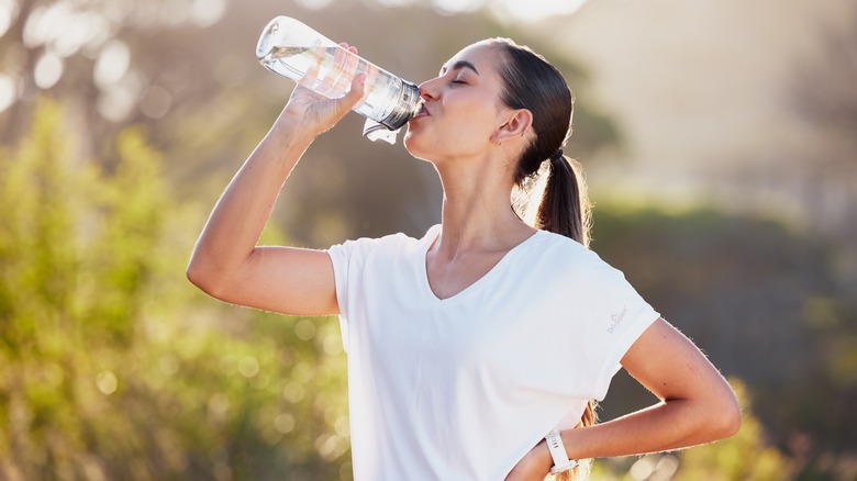 Woman hydrating