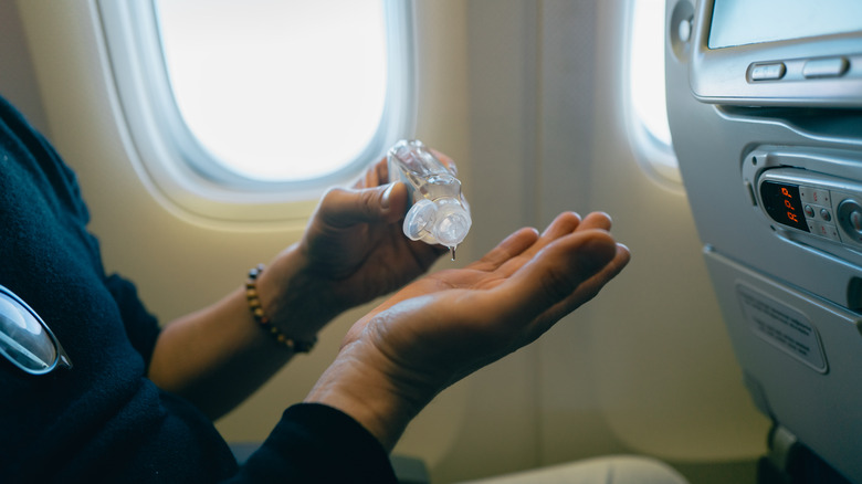 Using hand sanitizer on flight 