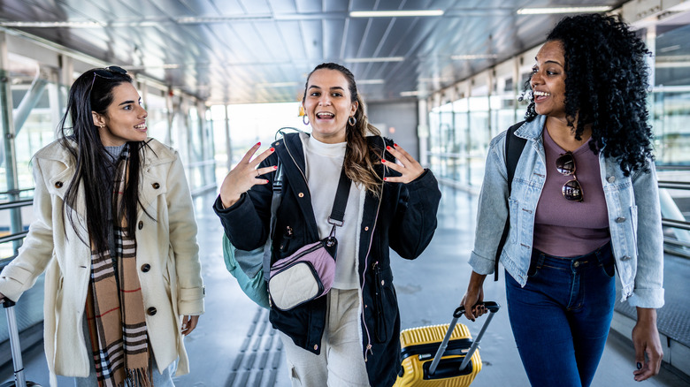 Women walking through an airport