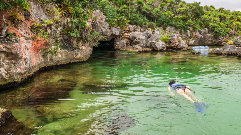 Woman snorkeling in Xel-Há