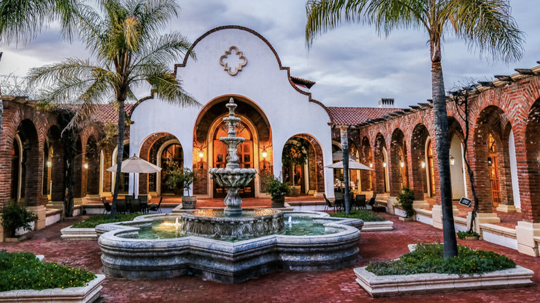 A courtyard with brick arches in Ensenada, Mexico