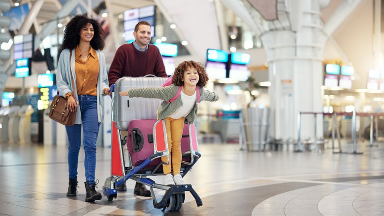 Family with suitcases