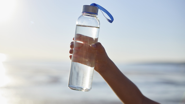 water bottle at the beach