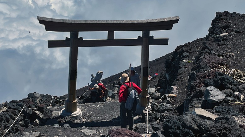 hikers nearing the summit of Mount Fuji in Japan