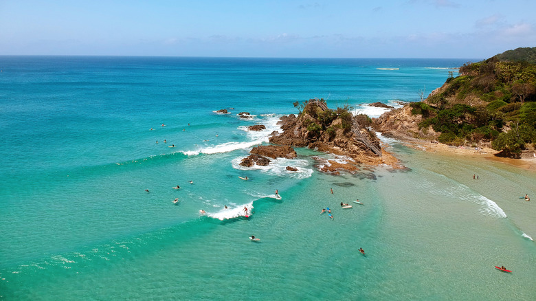 Surfers in the water at a beach