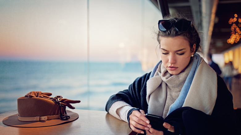 concerned woman on cruise ship